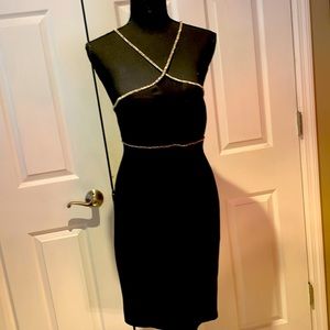 Women’s elegant black with rhinestone Gianni Bini  dress. Size small.